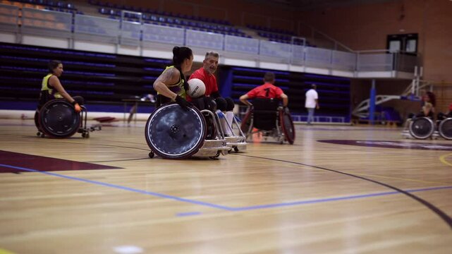 Wheelchair basketball players moving on the court during a game