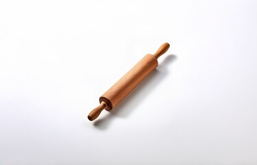 A wooden rolling pin sits on a white background.