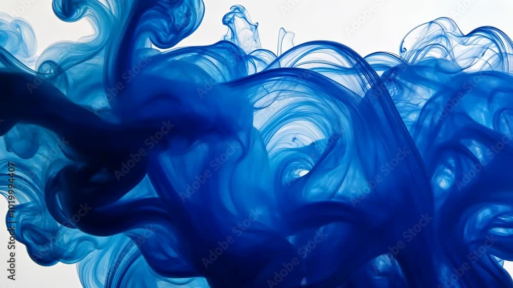 Poster blue ink swirls and dances in water, creating an abstract and mesmerizing pattern