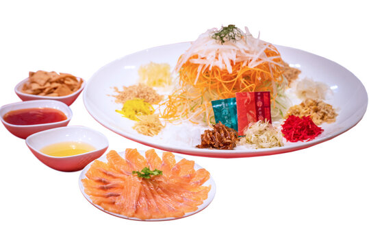 cny colourful smoked salmon yu sheng lo hei and sauces in red chinese new year background asian halal menu food banquet restaurant cafe	
