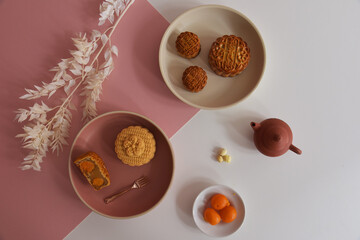 baked lotus paste red bean green tea durian color mooncake with egg yolk in traditional shape lantern china mid autumn festival halal product pastry sweet vegan gluten free food menu cafe restaurant