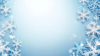Abstract background. A winter-themed background featuring delicate snowflakes against a soft blue backdrop