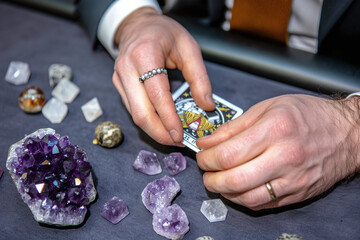 tarot reading in progress, drawing card from deck