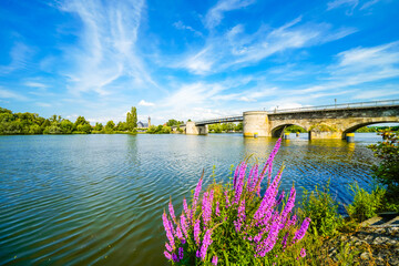 View of the Main and the Old Main Bridge in Kitzingen. Medieval stone bridge of the city.