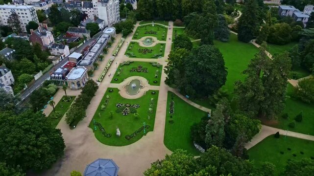 Beautiful aerial movement about the Parc du Thabor with botanical gardens, Rennes, France.