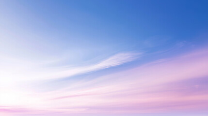 Soft pastel clouds in blue and pink sky at sunset