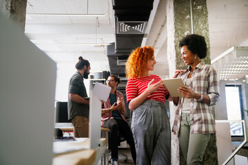 Software, coding and business woman on tablet thinking of data analytics, digital technology.