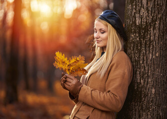 Young woman in the oak forest