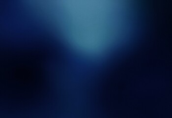 Fototapeta premium An abstract gradient background with dark blue hues and grainy texture.