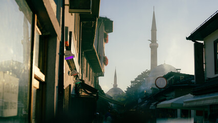 Sarajevo feeling, dreamy photo of one of sarajevo bascarsija streets, filled with smoke, minarets,...