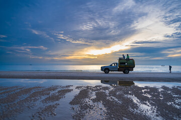Prachuap Khiri Khan, Thailand - September, 23, 2024 : Beachside Garbage Collection Truck by the...
