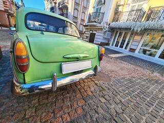 Retro car green color rear view