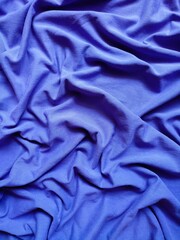 The texture and background of the fabric is blue