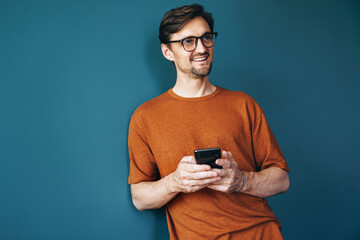 Business man using a smartphone in a professional office