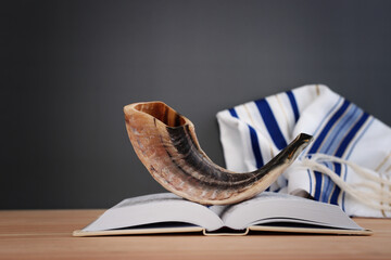 image of shofar (horn) on white prayer talit. Rosh hashanah (jewish New Year holiday), Shabbat and Yom kippur concept