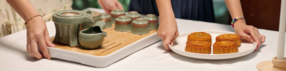 Header with family serving on the table