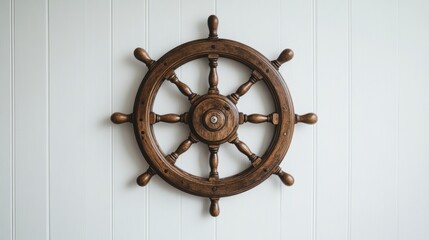 Fototapeta premium A plain white background shows a steering wheel from a boat. 
