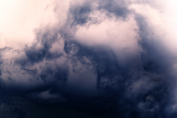 Dramatic blue sky with white clouds.