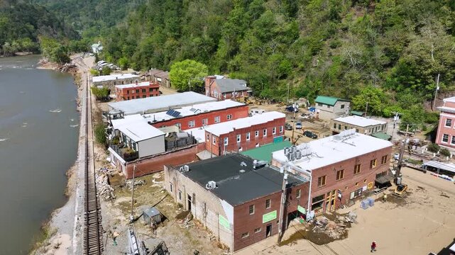 Aerial video of damage in downtown Marshall, NC, 1 week after flooding during tropical storm Helene.