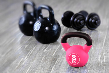 Kettlebells and dumbbells are sports fitness equipment. Fitness training lifestyle and healthy lifestyle concept.