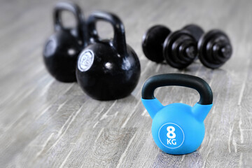 Kettlebells and dumbbells are sports fitness equipment. Fitness training lifestyle and healthy lifestyle concept.