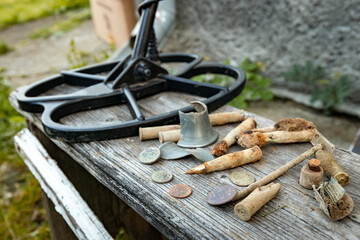 The result of searching for coins using a metal detector and a shovel.