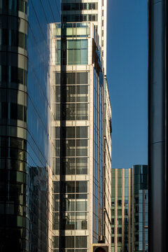 Captured within a financial district, this image showcases skyscrapers made of steel and glass, reflecting ambition, growth, and the contemporary urban ethos in London