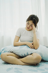 Image of young girl relaxing on bed