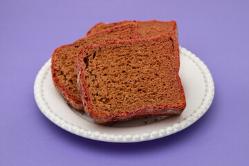 beet red bread on white small plate