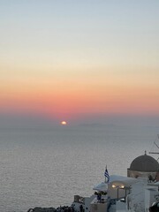 Obraz premium Couchée de soleil spectaculaire sur l'île de santorin