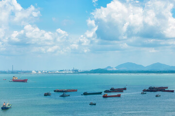 From the top of Nui Lon (Big Mountain) in Vung Tau city, looking out to Ghanh Rai bay, you can see Long Son island and Dinh mountain, Thi Vai mountain far behind.