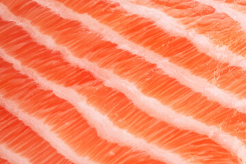Salmon fresh pink flesh texture or salmon fillet closeup.