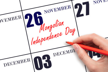 November 26. Hand writing text Mongolian Independence Day on calendar date. Save the date.