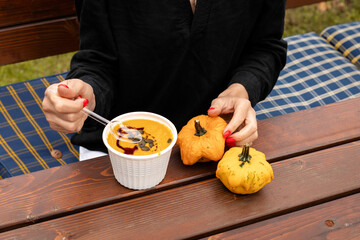 Ingathering.Pumpkins are lying on the table.Lots of pumpkins on market.Halloween