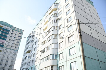 Fototapeta premium Cityscape of Russia. Panel house of the Soviet Union, old architecture of the building in the brutalism style