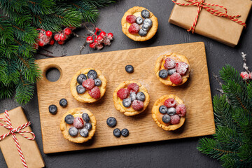 Festive delight: Christmas cupcakes adorned with berries