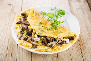 Plate of mushroom omelette. Ideal for healthy meals, breakfast, and gourmet dining