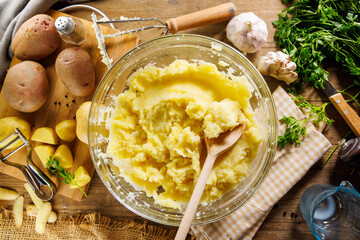 Cooking and preparing mashed potatoes. Perfect for comfort food and homemade meal concepts