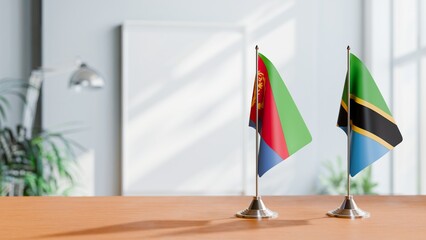 FLAGS OF ERITREA AND TANZANIA ON TABLE