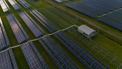 Aerial bird view photo of photovoltaic power station also known as a solar park is large-scale...