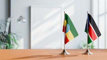 FLAGS OF ETHIOPIA AND SOUTH SUDAN ON TABLE