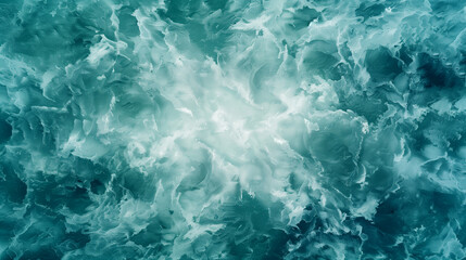 The image is of a large body of water with a lot of waves and foam. The water appears to be very cold and the waves are crashing against the shore. Scene is one of power and energy