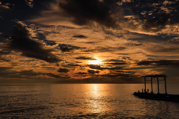 beautiful warm sunset on the sea coast