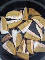 Cooking boletus mushroom. 