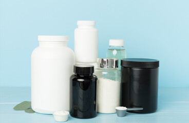 Jar with protein powder on table. Sports nutrition concept