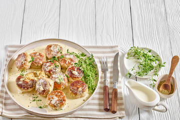 juicy chicken rissoles, cakes in rich cream sauce