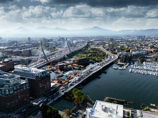 Aerial view of bridge road with cars over Charles river. Boston. Massachusetts, USA.