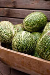 Ingathering.Pumpkins are lying on the table.Lots of pumpkins on market.Halloween