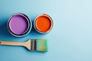Colorful Paint Cans with Brush on Blue Background
