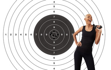Hit the target, concept of achieving set goals. African smiling woman with gun isolated on white...